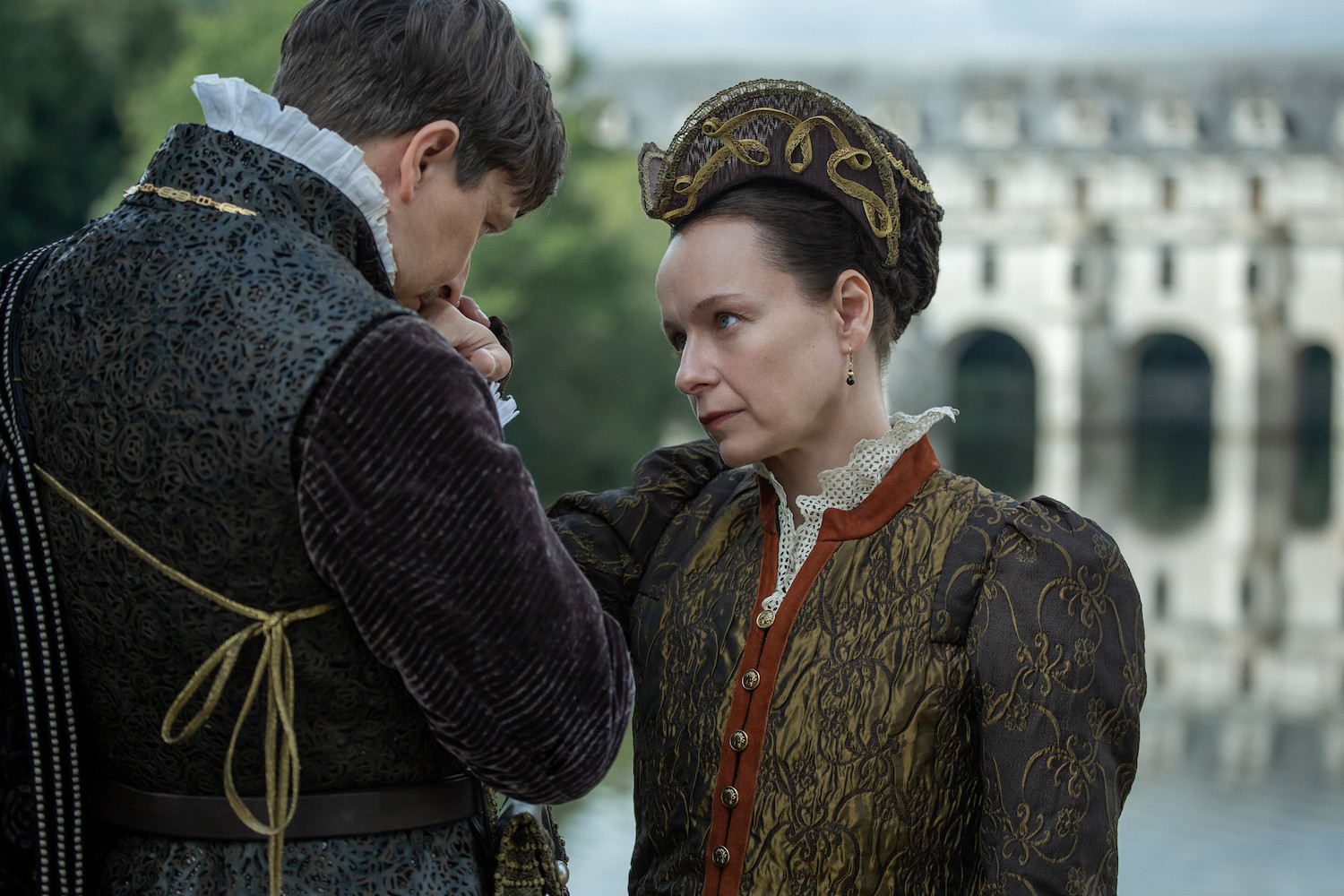 Picture shows: Henri (Lee Ingleby) kisses Catherine's (Samantha Morton) hand, with Chenonceaux reflected in the lake in the background.