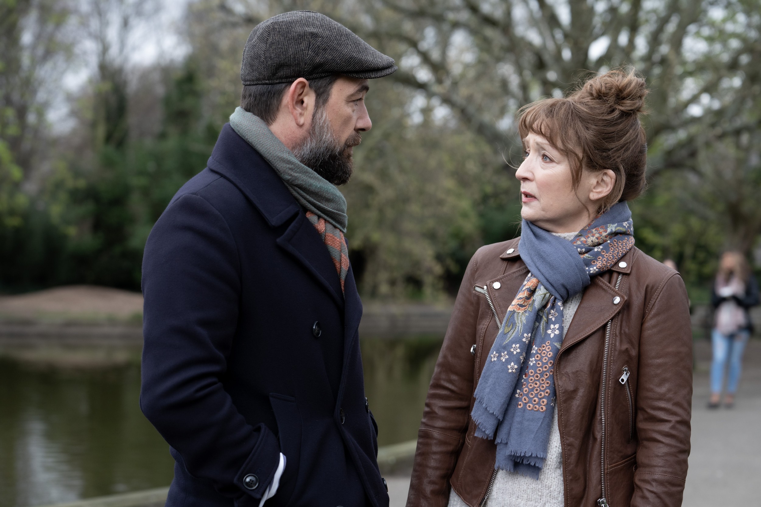 Picture shows: Alexandros Logothetis as Andreas Patakis and Lesley Manville as Susan Ryeland in the park