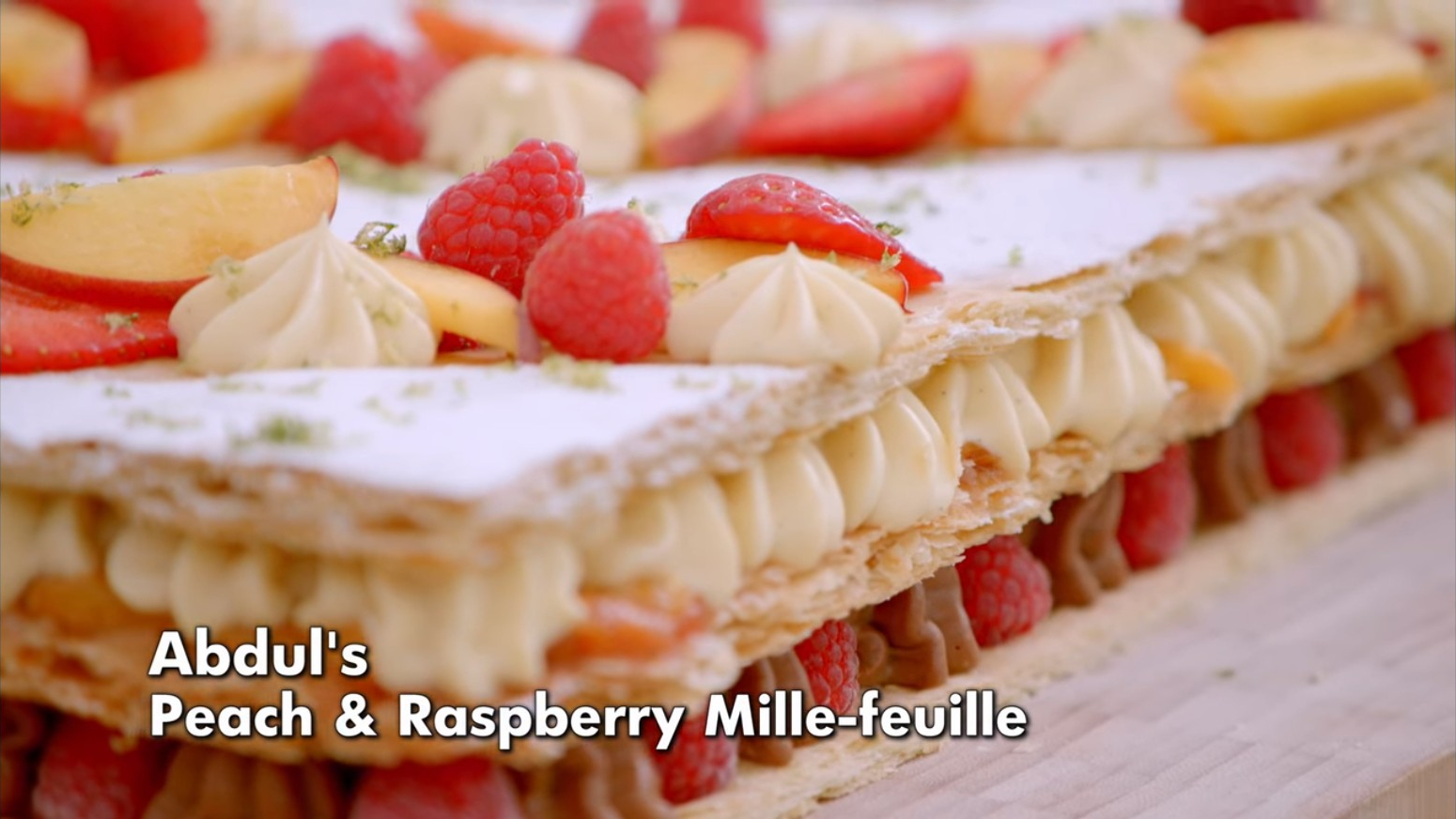 Picture shows: Abdul's Peach & Raspberry Mille-feuille Showstopper from The Great British Baking Show's Custard Week