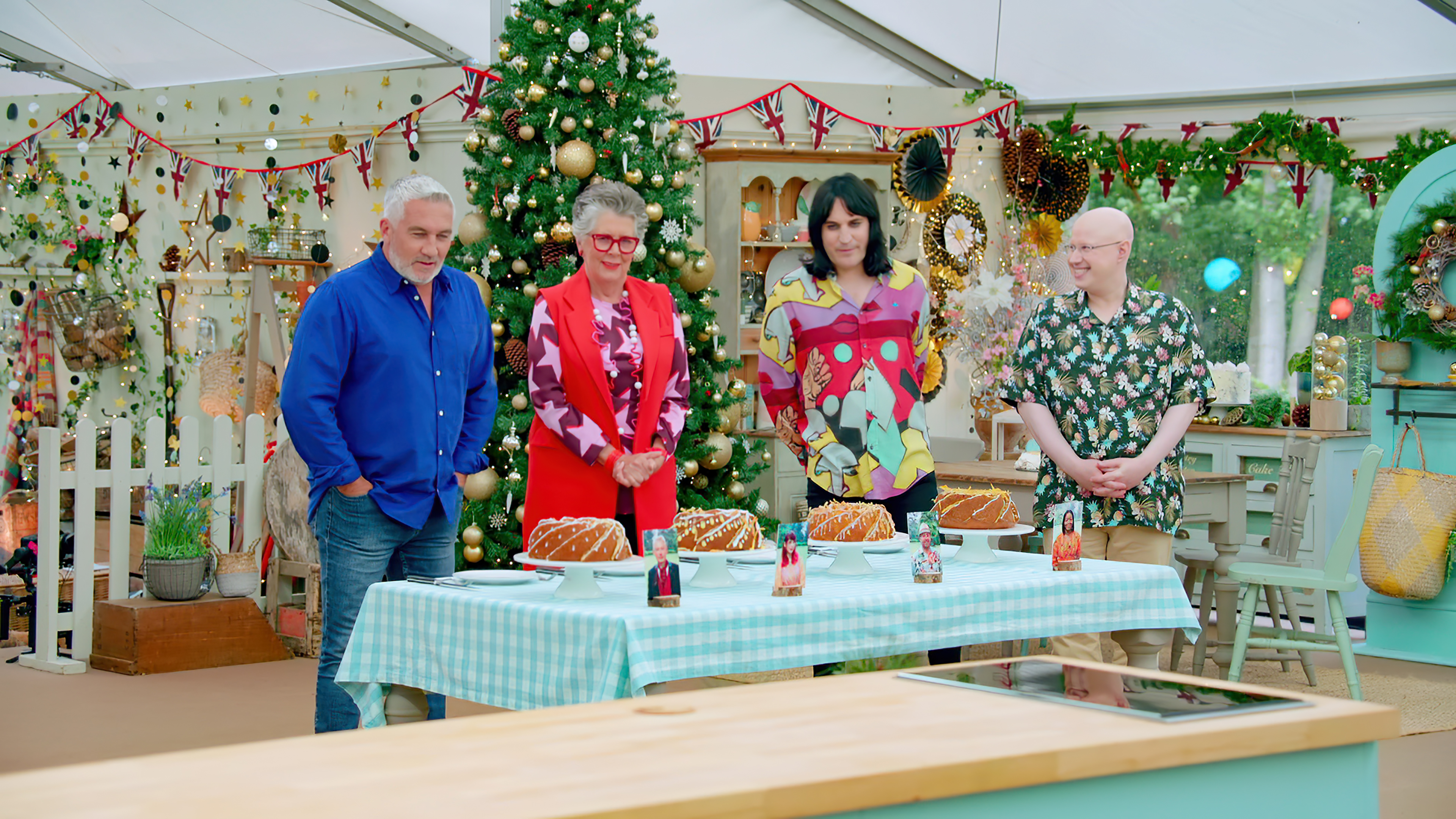 Picture shows: Paul and Prue judge the Technical Bakes of Hermine, Kim-Joy, Matt Lucas, Rowan, and Jon in 'The Great British Baking Show: Holidays' Season 5 