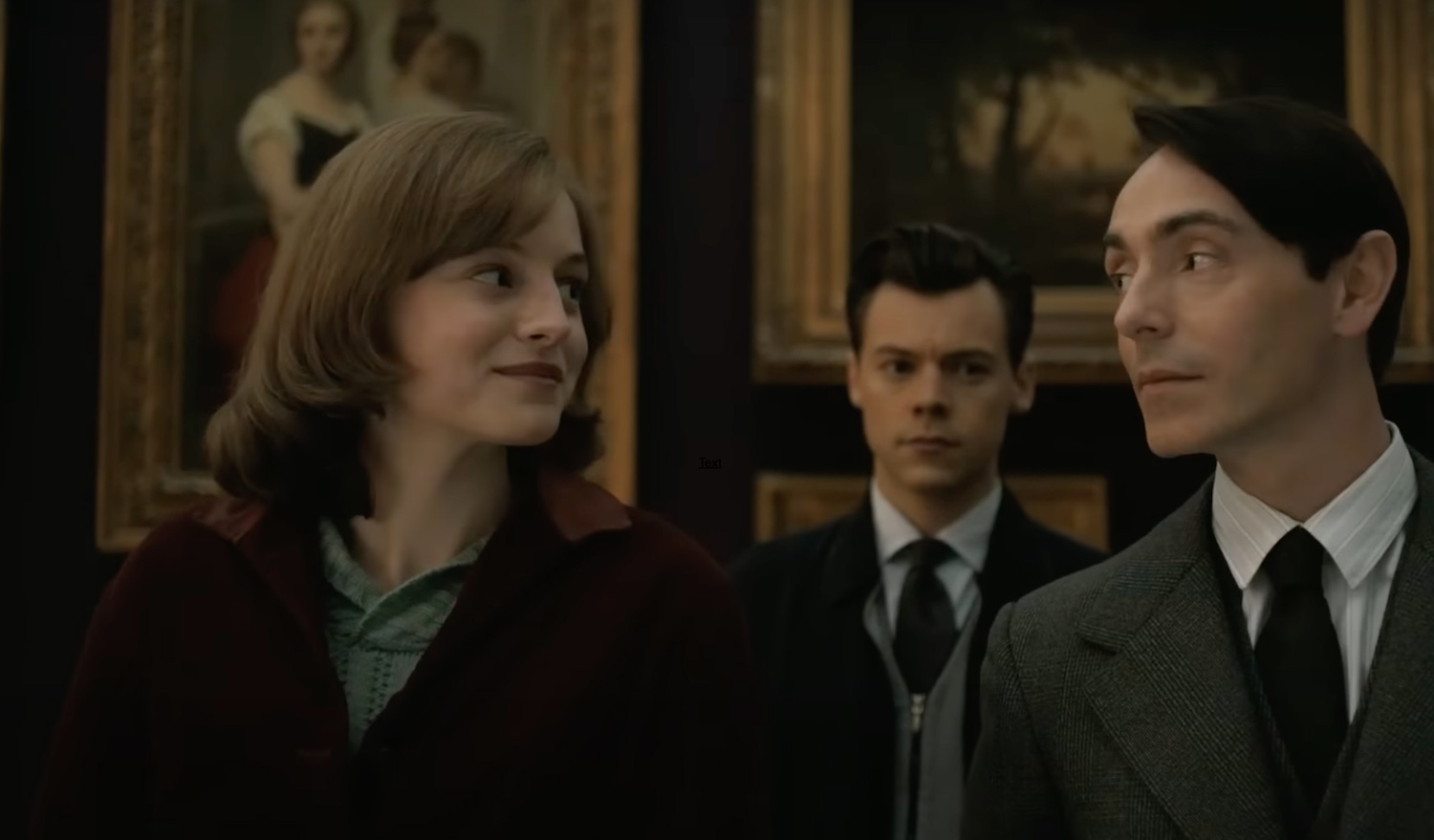Picture shows: In an art gallery, Marion (Emma Corrin) bonds with Patrick (David Dawson) as Tom (Harry Styles) looks on.