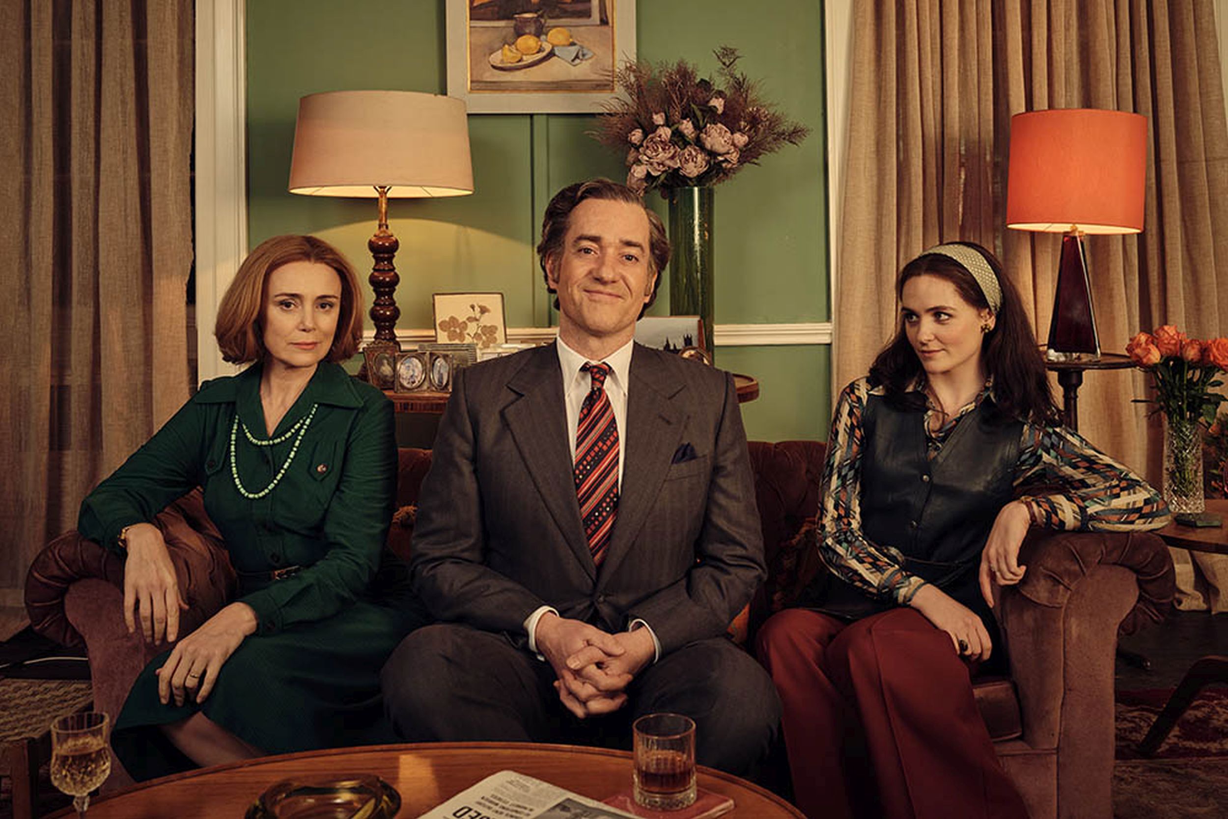 Picture shows: Keeley Hawes as Barbara Stonehouse, Matthew Macfadyen as John Stonehouse, and Emer Heatley as Sheila Buckley in 'Stonehouse'