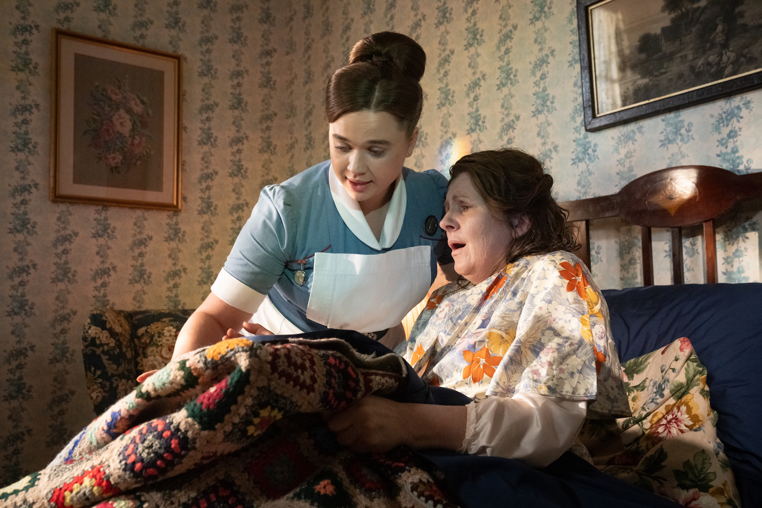 Picture shows: Nurse Nancy Corrigan (Megan Cusack) tends to patient Olive Macketts (Clare Burt).