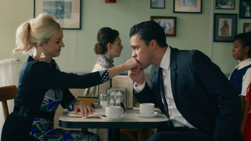 Picture shows: Matthew Aylward (Olly Rix) kisses the hand of Trixie Franklin (Helen George). They're seated in a cafe.