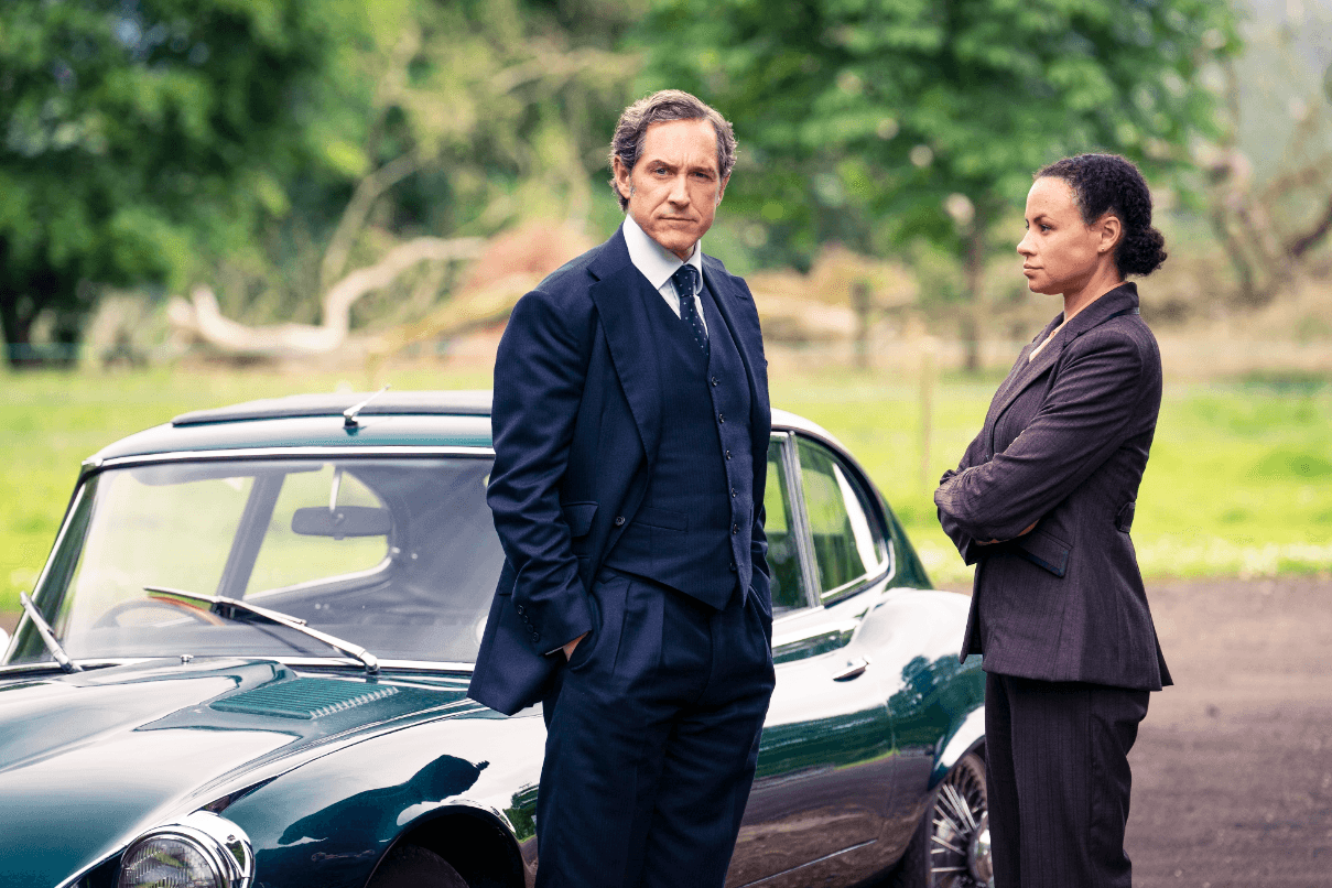 Picture shows: Adam Dalgliesh (Bertie Carvel) and Kate Miskin (Carlyss Peer). They are standing by Dalgliesh's car.
