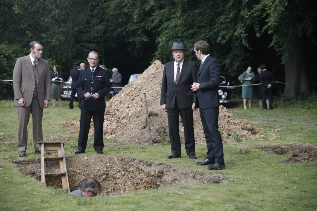 Picture shows: The team ––  Jim Strange (Sean Rigby), Reginald Bright (Anton Lesser), Fred Thursday (Roger Allam), and Morse (Sean Evans) gather round the grave where Dr. Max DeBryn (James Bradshaw) uncovers a skeleton.