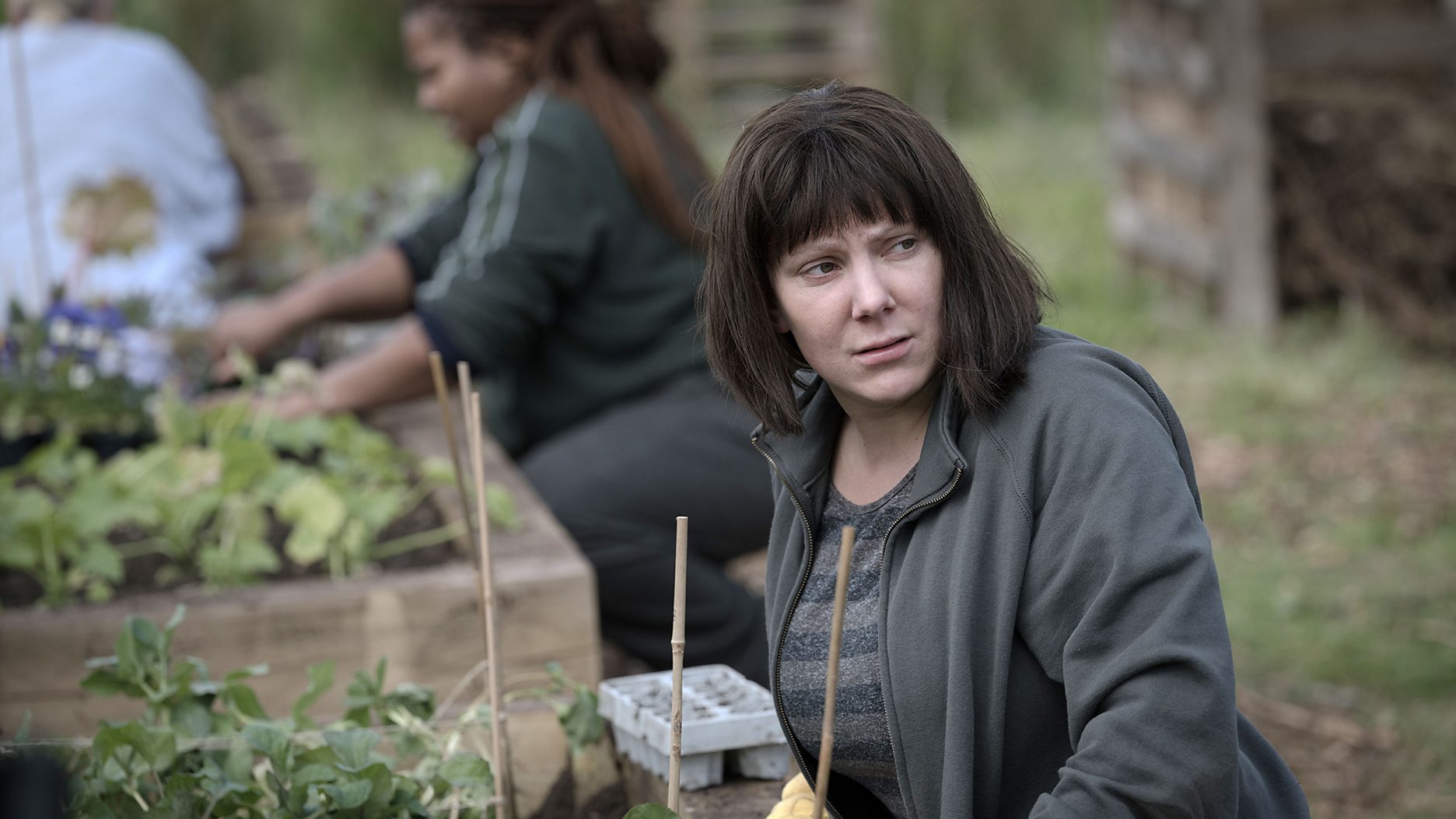 Sophie Willan as Maeve Riley working in the prison gardens in 'Time' Season 2