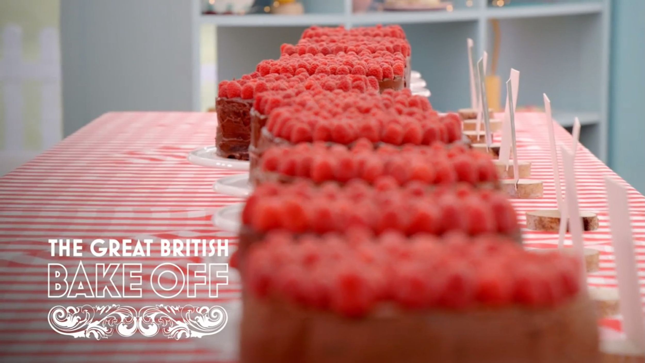 All of the chocolate fudge cakes lined up  on the altar for the Cake Week Technical Challenge in The Great British Baking Show