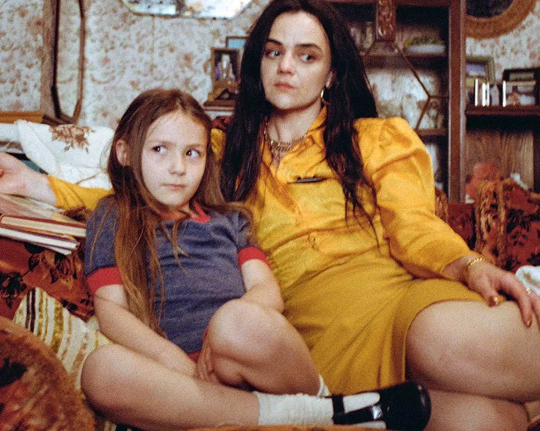 Lily-Beau Leach as Young Maria and Hayley Squires as Cynthia in a family photo in Hoard