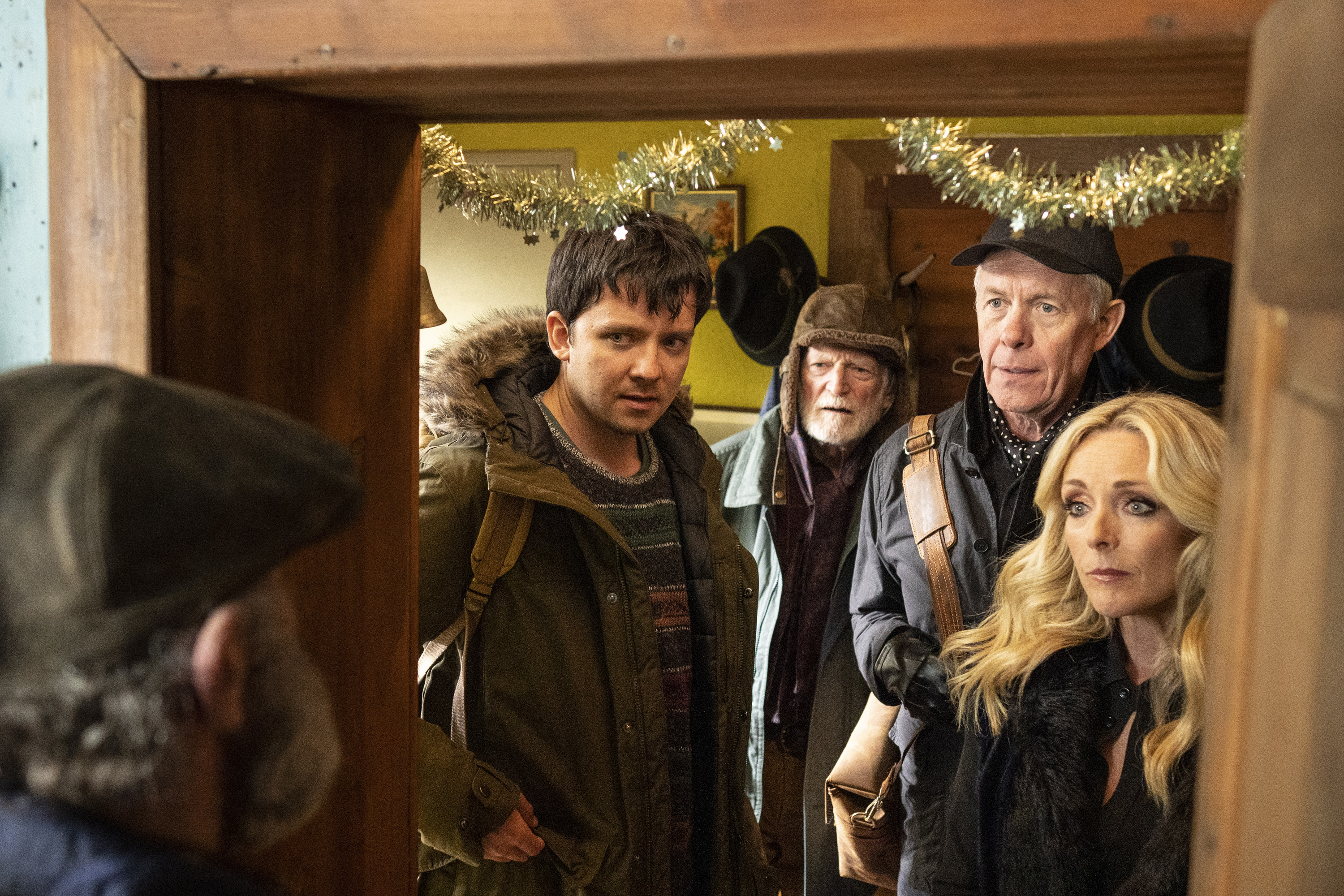 The Hughes Family in the cabin in Your Christmas or Mine 2