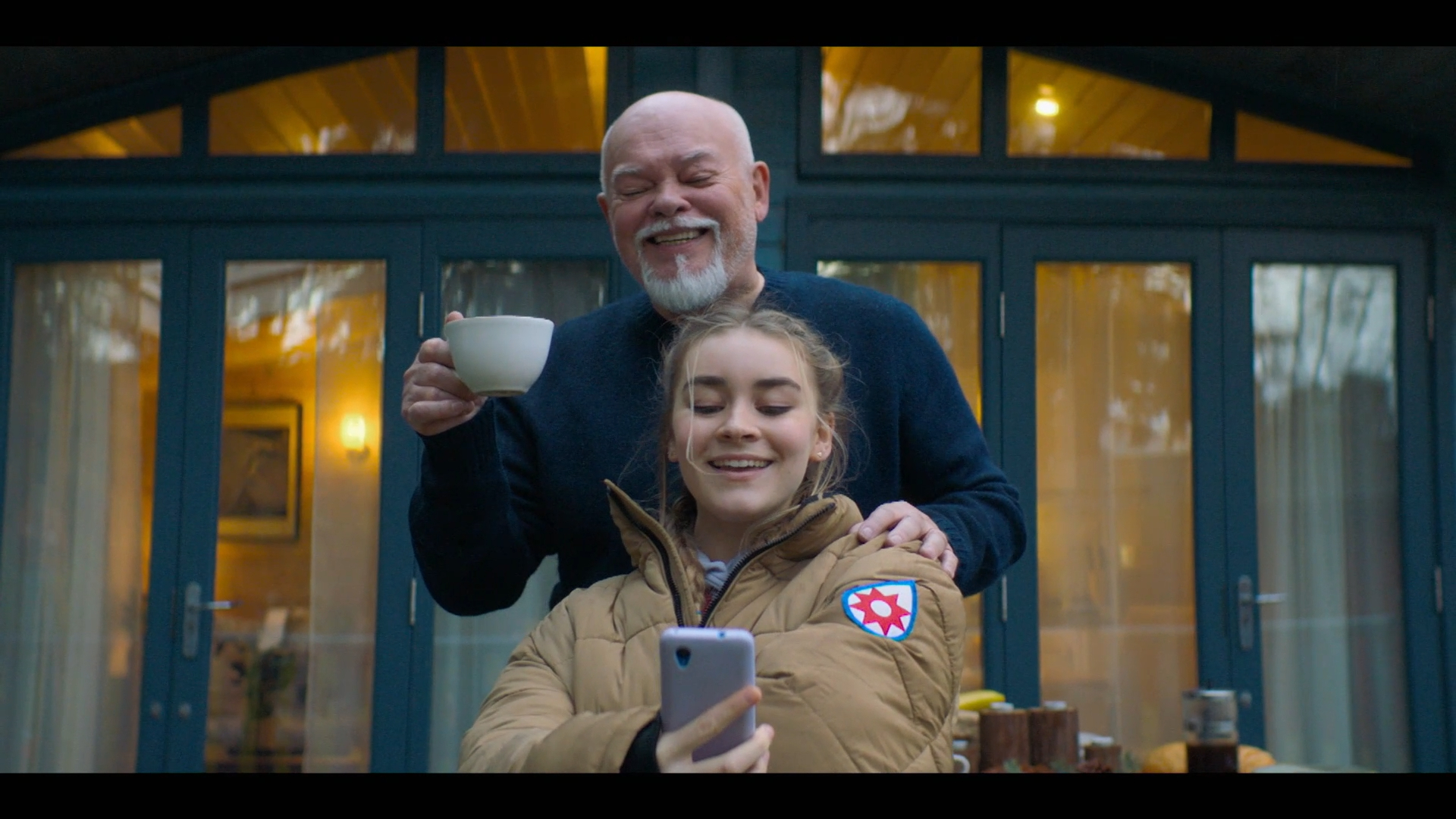 Silvie Furneaux as Morgan Strandhed and Sven Henriksen as Magnus Strandhed take a selfie in 'Annika' Season 2