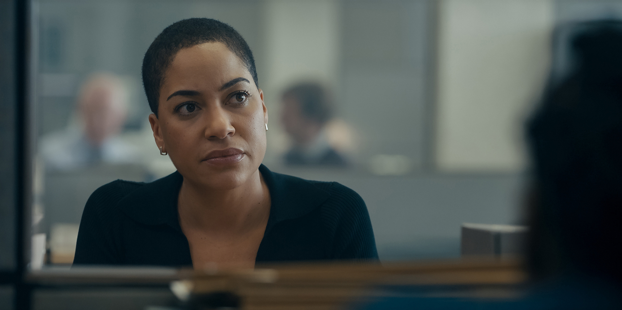 Cush Jumbo as Detective Sergeant June Lenker at her desk in 'Criminal Record' Season 1