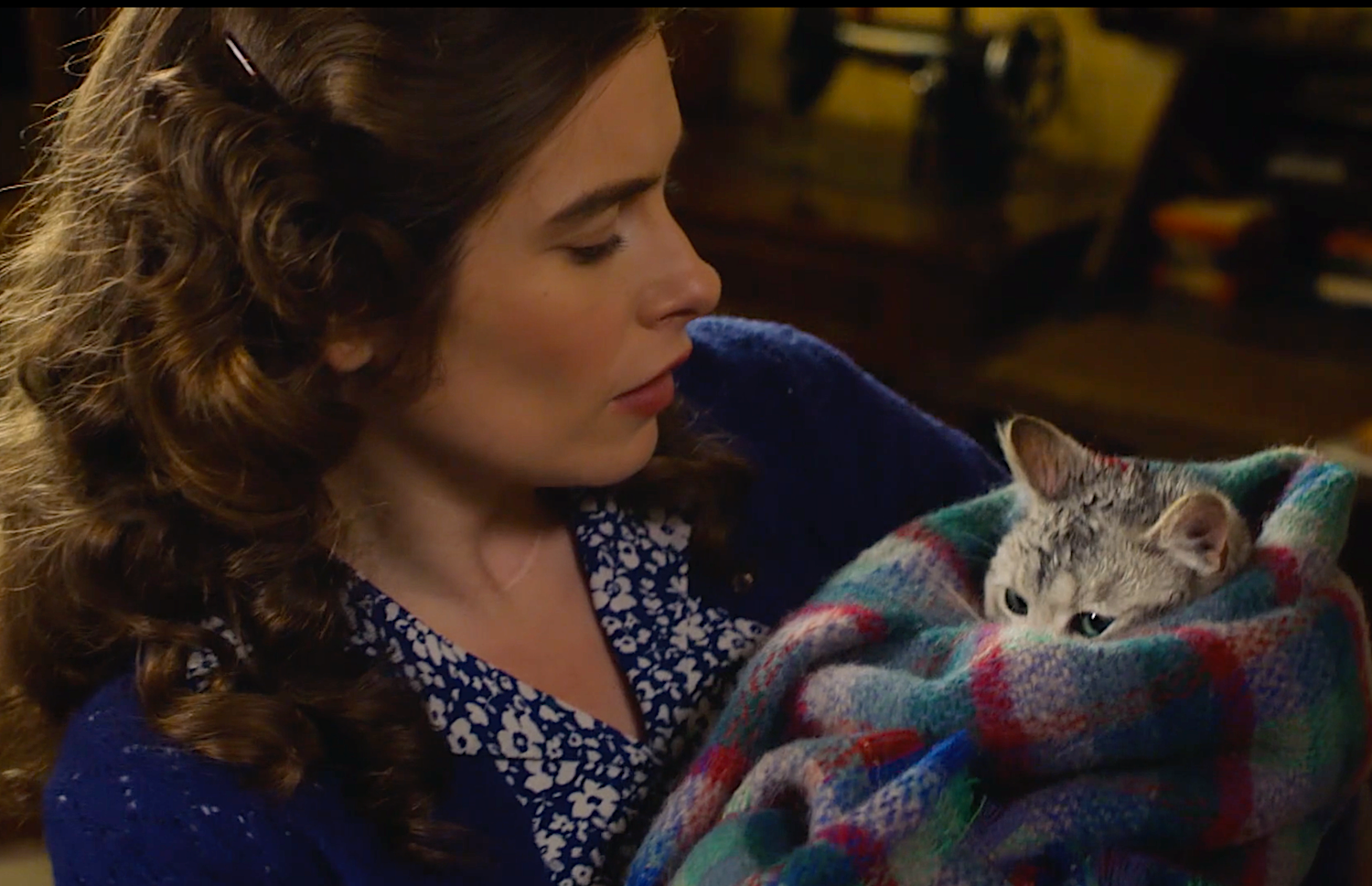 Picture shows: Helen (Rachel Shenton) cuddles the rescued cat Oscar.