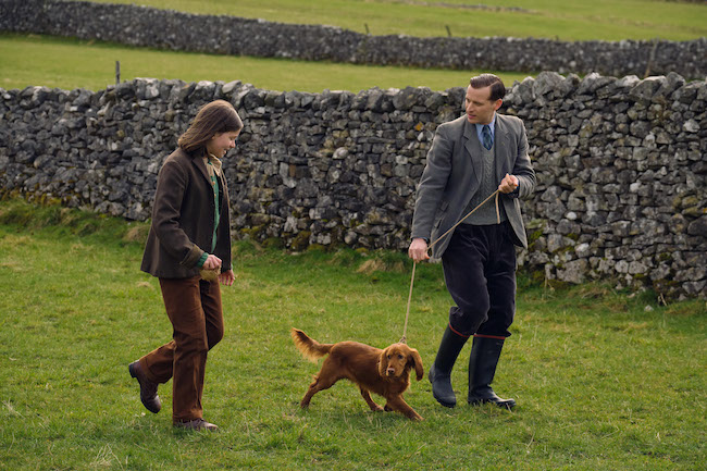 Jenny Alderson (Imogen Clawsen), James Herriot (Nicholas Ralph), and Scruff the dog. Credit: Courtesy of Playground Television (UK) Ltd.