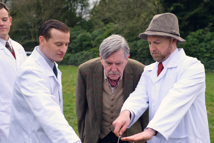 Tristan Farnon (Callum Woodhouse), James Herriot (Nicholas Ralph), Colonel Merrick (James Fleet), and Siegfried Farnon (Samuel West). Credit: Courtesy of Playground Television (UK) Ltd.