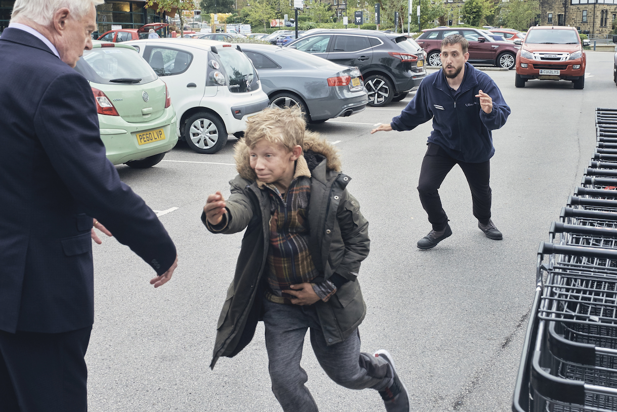 Harrison (Liam McCheyne) makes a run for it, right into Alan (Derek Jacobi)     (Credit: Courtesy of Stuart Wood)