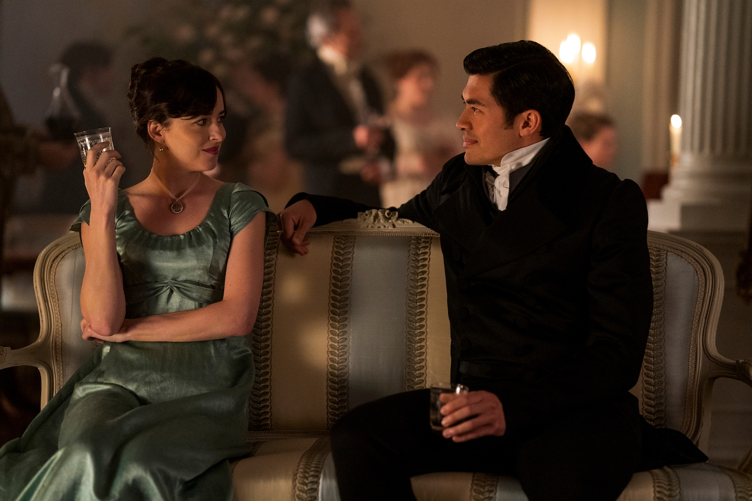 Anne Elliot (Dakota Johnson) and Mr. Elliot (Henry Golding). Photo: Nick Wall / Courtesy of Netflix