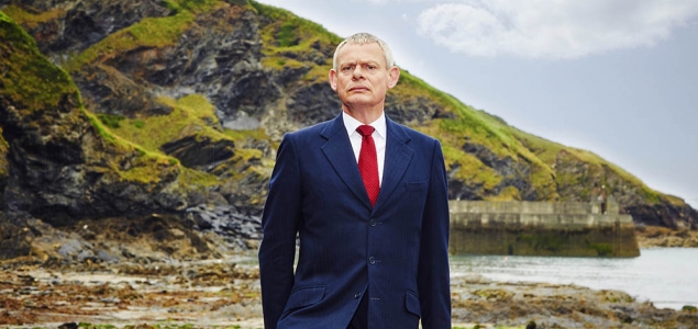 Martin Clunes gets a super dramatic backdrop in this Series 7 "Doc Martin" shot. (Photo: ITV)