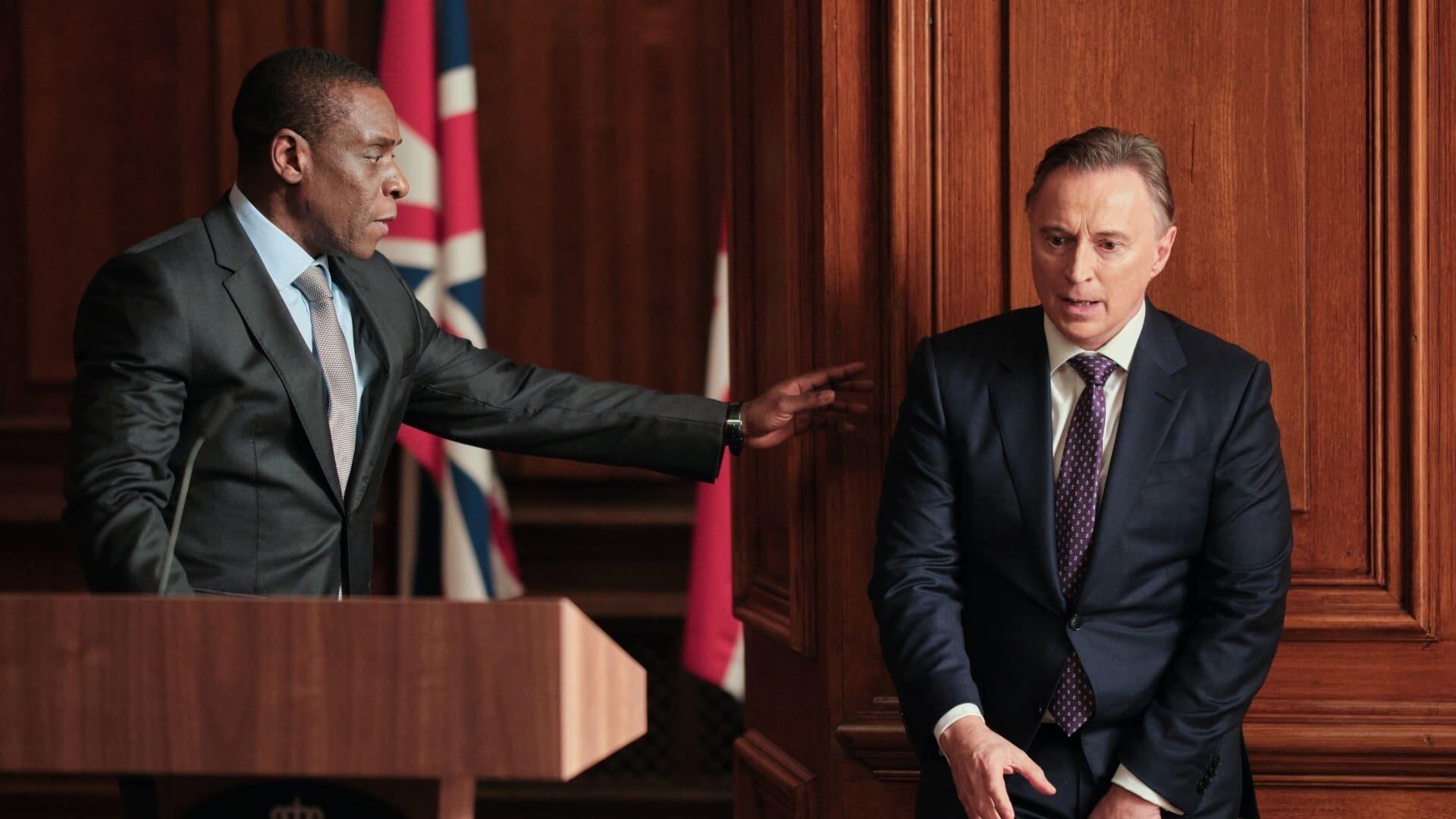 Joseph Obasi (Richard Pepple) and Robert Sutherland (Robert Carlyle). Credit: Courtesy of © 2021 New Pictures Ltd