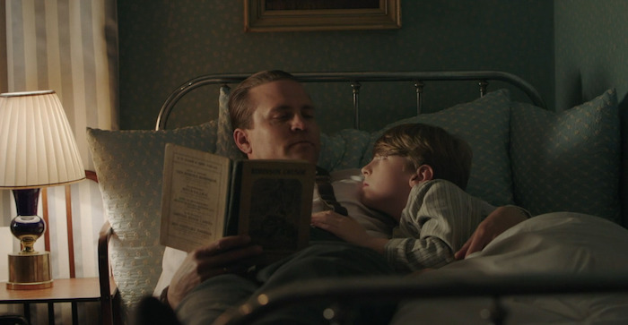 Olav (Tobias Santelmann) reads to his son Harald (Antonín Frceak).. Courtesy of MASTERPIECE