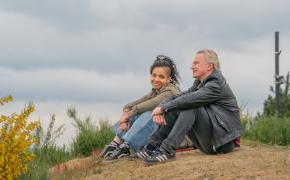 Talitha Wing as Destiny hangs out on the side of a hill with Robert Carlyle as her father Gaz in 'The Full Monty'