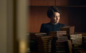 Keeley Hawes as Cassandra Austen looks through her sister's books in 'Miss Austen'