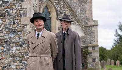 Picture shows: Tim McMullen as Atticus Pund and Matthew Beard as James Fraser in the cemetery in PBS' 'Magpie Murders'