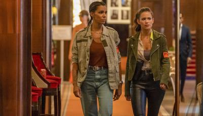 Tamara Marthe as Léa Robert and Lucie Lucas as Det Camille Delmasse walk through a fancy hotel in 'Cannes Confidential' Season 1