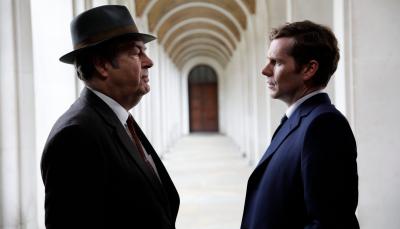 Roger Allam as Fred Thursday and Shaun Evans as Endeavour Morse face off in a alcove in Endeavour: The Final Season