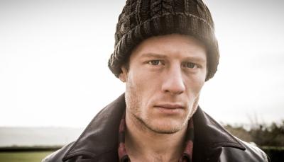 James Norton as Tommy Lee Royce walking outside in the Yorkshire winter in 'Happy Valley' Season 1 