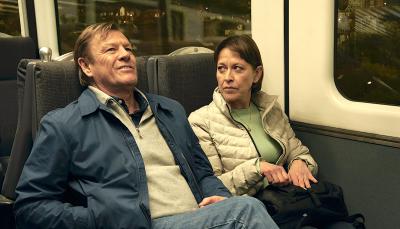 Sean Bean as Ian and Nicola Walker as Emma riding the tube in Marriage. 
