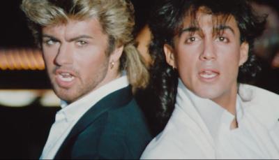 George Michael and Andrew Ridgeley pose with big fluffy 1980s hairdos in Wham!