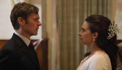 Picture shows: Endeavour (Sean Evans) and Joan Thursday (Sara Vickers) look intently at each other. She's wearing a wedding dress.