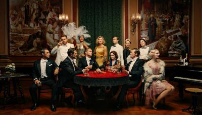 The cast of Hotel Portofino Season 2 around a poker table.
