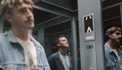 Paul Mescal as Harry and Andrew Scott as Adam meet in a great glass elevator in 'All of Us Strangers'