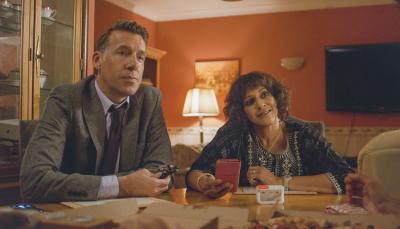 Craig Parkinson as DCI Burton and Meera Syal as Mrs. Sidhu question suspects over food in 'Mrs. Sidhu Investigates' Season 1