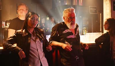 Picture shows: Citra Li (Django Chan-Reeves) and Hendrik Davie (Darrell D’Silva) at the bar of the nightclub.