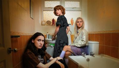 Kat Sadler as Josie, Louise Brealey as Deb, and Lizzie Davidson as Billie are trapped in the bathroom in 'Such Brave Girls'