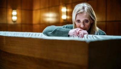 Anne Marie Duff as Susannah Frater crying over her daughter's coffin in 'Suspect' Season 1