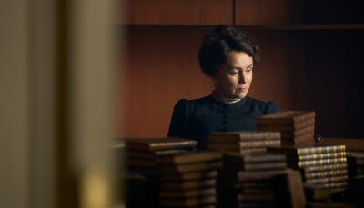 Keeley Hawes as Cassandra Austen looks through her sister's books in 'Miss Austen'