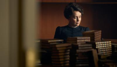 Keeley Hawes as Cassandra Austen looks through her sister's books in 'Miss Austen'