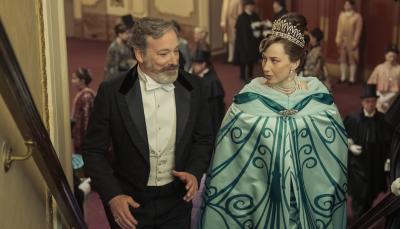 Jeremy Shamos as Mr. Gilbert and Carrie Coon as Bertha Russell, her gown cloaked, in 'The Gilded Age' finale