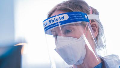 Joanne Froggatt as Dr Abbey Henderson in pandemic standard hospital clothing in 'Breathtaking'