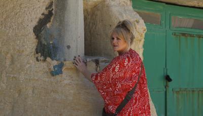 Sally Lindsay as Jean White looking for clues in old ruins in 'The Madame Blanc Mysteries' Season 3