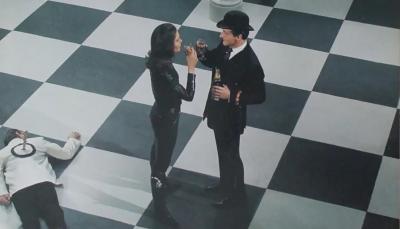 Patrick Macnee and Diana Rigg as Steed and Mrs. Peel in the famous cheesboard opening title sequence made for the American broadcast of 'The Avengers'