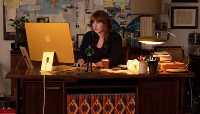 Bryce Dallas Howard typing away at her Apple products as Elly Conway in Apple TV+'s 'Argylle'