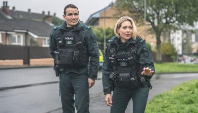Martin McCann as Stevie Neil and Siân Brooke as Grace Ellis on patrol in 'Blue Lights' Season 2
