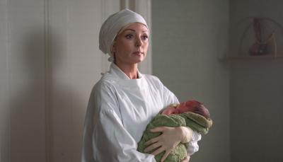 Helen George as Trixie Franklin delivers a baby in the Call The Midwife Season 13 premiere