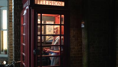 Helen George as Trixie Aylward on the phone in Call the Midwife Season 13, Episode 4 