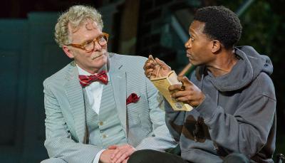 Daniel Pearce as Polonius and Ato Blankson-Wood as Hamlet discuss poetry in 'Hamlet'